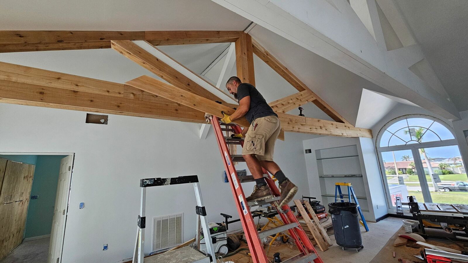 Framing new wood trusses under a vaulted ceiling